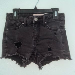 Black ripped shorts